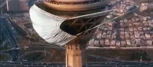 На телебашню в Иране надели маску из-за коронавируса - Sputnik Латвия