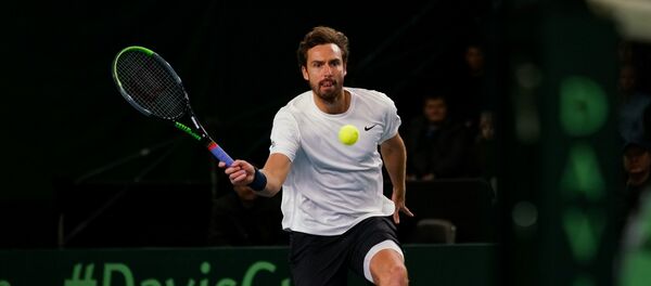 Поединок Кубка Дэвиса во II Мировой группе между сборными Латвии и Египта. Латвийский теннисист Эрнест Гулбис - Sputnik Латвия