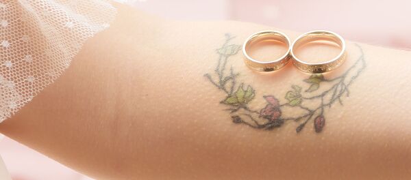 Обручальные кольца, архивное фото - Sputnik Латвия