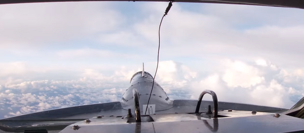 Полет Ту-142 над Северным Ледовитым океаном показали на видео Полет Ту-142 над Северным Ледовитым океаном показали на видео - Sputnik Latvija