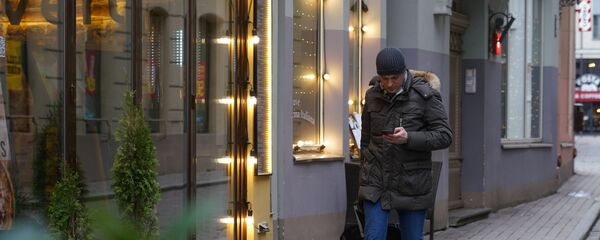 Турист в Старой Риге Турист в Старой Риге - Sputnik Latvija