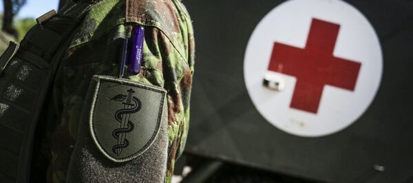 Военный врач, архивное фото Военный врач, архивное фото - Sputnik Latvija