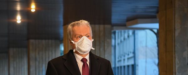 Президент Гитанас Науседа посетил оперативный штаб экстремальных ситуаций Президент Гитанас Науседа посетил оперативный штаб экстремальных ситуаций - Sputnik Latvija
