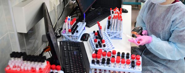 Тестирование на COVID-19  Тестирование на COVID-19  - Sputnik Latvija