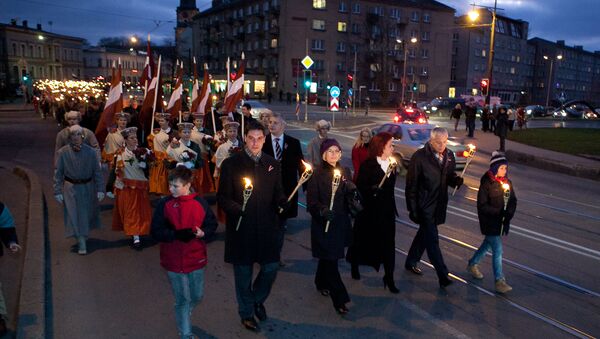Факельное шествие в День Лачплесиса - Sputnik Латвия