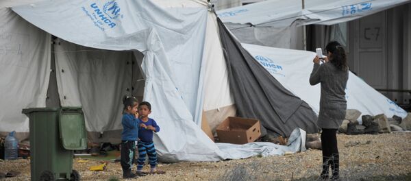 Лагерь беженцев Табановце в Македонии около македоно-сербской границы Лагерь беженцев Табановце в Македонии около македоно-сербской границы - Sputnik Latvija