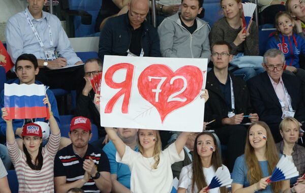 Болельщики сборной России во время матча группового этапа чемпионата мира по хоккею между сборными командами Латвии и России. Болельщики сборной России во время матча группового этапа чемпионата мира по хоккею между сборными командами Латвии и России. - Sputnik Латвия