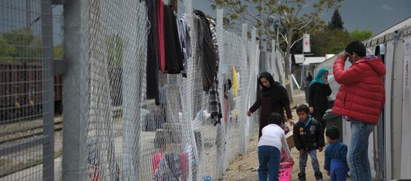 Лагерь беженцев Табановце в Македонии около македоно-сербской границы Лагерь беженцев Табановце в Македонии около македоно-сербской границы - Sputnik Latvija