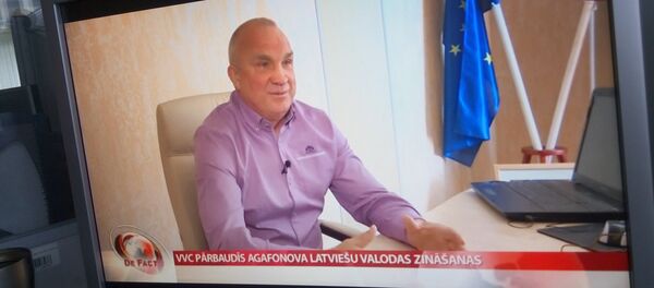 Телепрограмма De Facto LTV на экране монитора Телепрограмма De Facto LTV на экране монитора - Sputnik Latvija