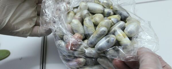 Контейнеры с изъятым героином в экспертно-криминалистическом центре - Sputnik Латвия