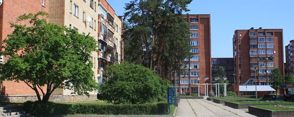 Жилые дома вокруг центральной площади Висагинаса Жилые дома вокруг центральной площади Висагинаса - Sputnik Латвия