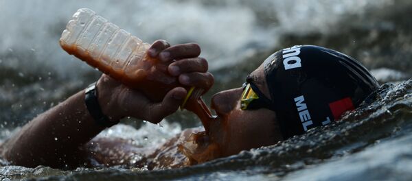 Усама Меллули на XVI чемпионате мира по водным видам спорта в Казани Усама Меллули на XVI чемпионате мира по водным видам спорта в Казани - Sputnik Латвия