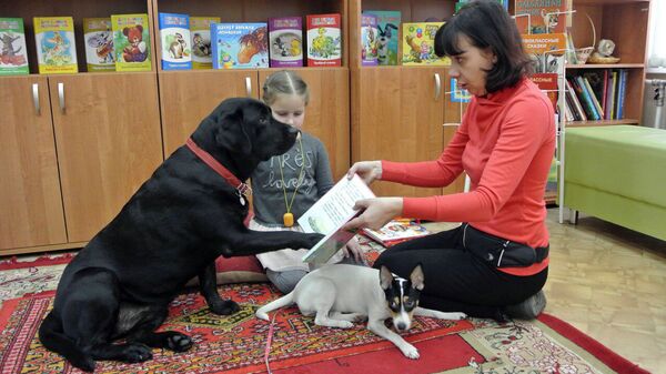 Проект КниГАВ - дети читают книги домашним питомцам Проект КниГАВ - дети читают книги домашним питомцам - Sputnik Латвия