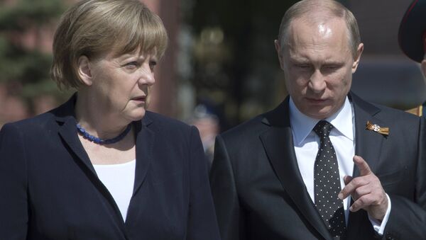 Президент Российской Федерации Владимир Путин и канцлер ФРГ Ангела Меркель - Sputnik Латвия