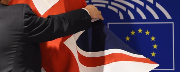 Британский флаг в Европейском парламенте в Брюсселе Британский флаг в Европейском парламенте в Брюсселе - Sputnik Латвия