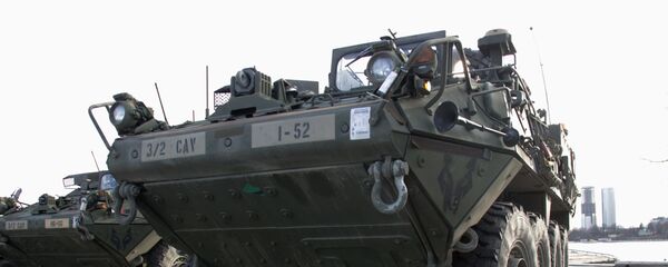Американские бронетранспортеры Stryker на показательном марше военнослужащих армии США Dragoon Ride в Латвии Американские бронетранспортеры Stryker на показательном марше военнослужащих армии США Dragoon Ride в Латвии - Sputnik Латвия