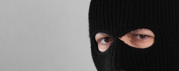 Cilvēks balaklavā. Foto no arhīva Cilvēks balaklavā. Foto no arhīva - Sputnik Latvija