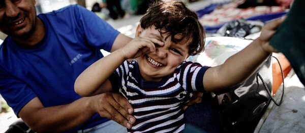 Беженцы с Ближнего Востока - Sputnik Латвия
