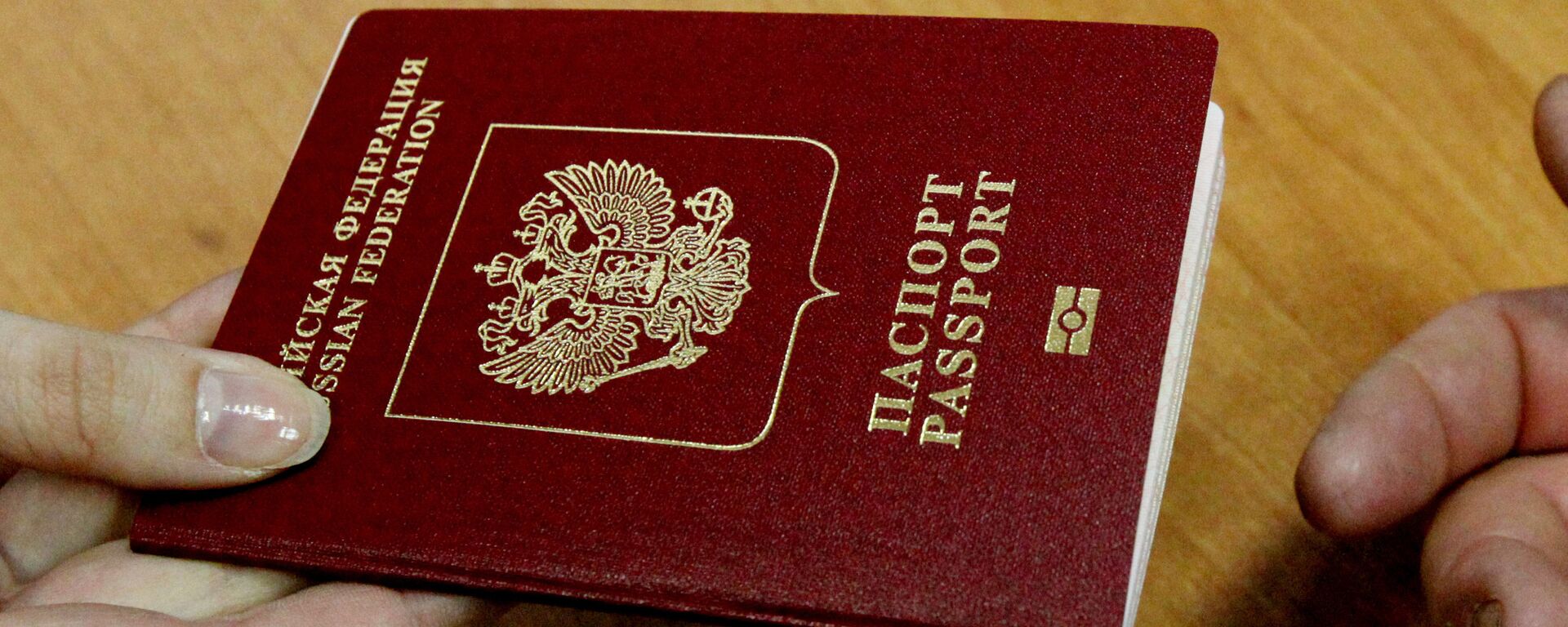 Оформление и выдача биометрических заграничных паспортов - Sputnik Латвия, 1920, 28.12.2023