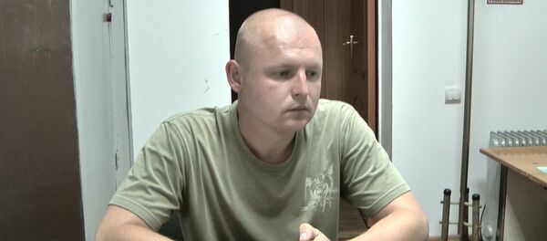 Переводчик миссии ОБСЕ на Украине признался в шпионаже. Съемка ФСБ - Sputnik Латвия