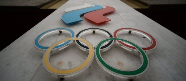 Вывеска Олимпийского комитета России в Москве - Sputnik Латвия