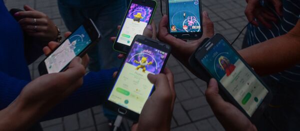 Игровое приложение Pokemon Go от компании Nintendo. Игровое приложение Pokemon Go от компании Nintendo. - Sputnik Latvija