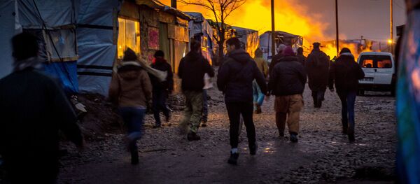 Des migrants à Calais, France Des migrants à Calais, France - Sputnik Latvija