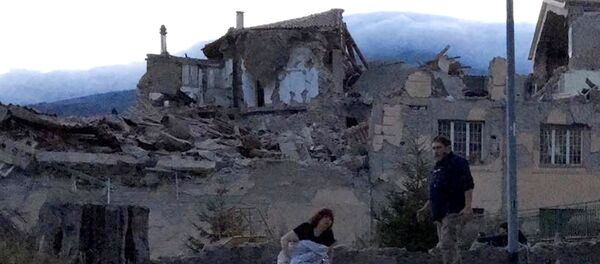 На месте землетрясения в городе Аматриче, Италия - Sputnik Латвия