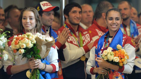 Встреча золотого рейса с чемпионами и призерами XXXI Олимпийских игр - Sputnik Latvija
