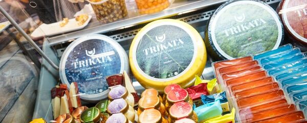 Разнообразный ассортимент сыра от латвийского производителя молочных продуктов Trikata - Sputnik Латвия