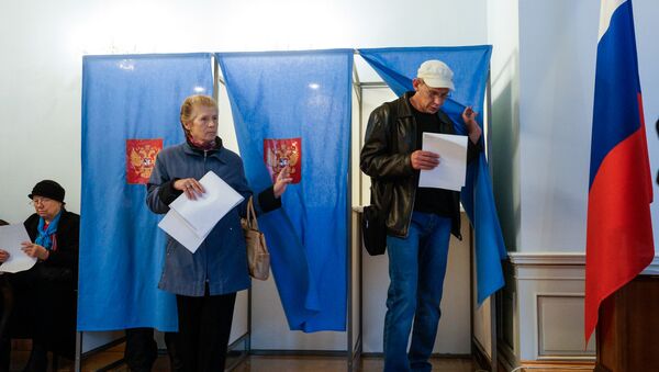 На избирательном участке в Посольстве России - Sputnik Латвия