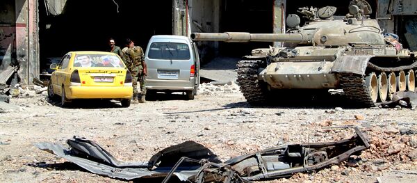 Sīrijas armijas karavīri atbrīvotā Alepo rajona teritorijā. Foto no arhīva Sīrijas armijas karavīri atbrīvotā Alepo rajona teritorijā. Foto no arhīva - Sputnik Latvija