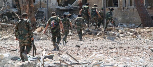 Сирийская армия освободила от боевиков территорию военных училищ в Алеппо Сирийская армия освободила от боевиков территорию военных училищ в Алеппо - Sputnik Latvija