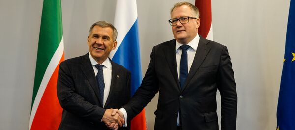 Президент Республики Татарстан Рустам Минниханов и Министр экономики и вице-премьер Латвии Арвилс Ашераденс - Sputnik Латвия