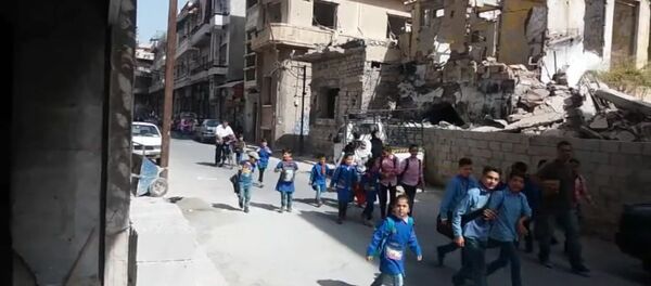 Мирная жизнь в освобожденном от террористов Хомсе Мирная жизнь в освобожденном от террористов Хомсе - Sputnik Латвия