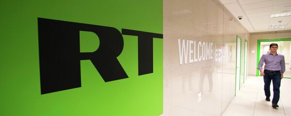 Телеканал Russia Today Телеканал Russia Today - Sputnik Latvija