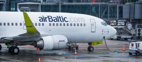 Самолет аirBaltic у Северного терминала аэропорта Риги - Sputnik Латвия