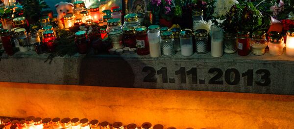 Свечи в память о жертвах трагедии в Золитуде 21 ноября 2013 года Свечи в память о жертвах трагедии в Золитуде 21 ноября 2013 года - Sputnik Латвия