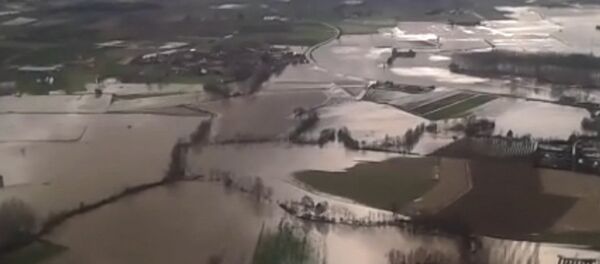 Последствия наводнения на северо-западе Италии. Съемка с вертолета Последствия наводнения на северо-западе Италии. Съемка с вертолета - Sputnik Латвия