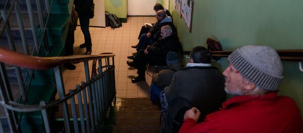 Очередь на приём в ночлежку - Sputnik Латвия