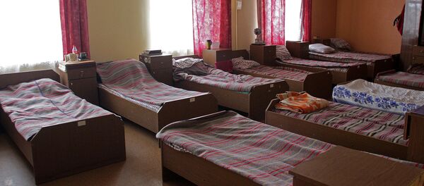 Кровати в приюте для бездомных - Sputnik Латвия