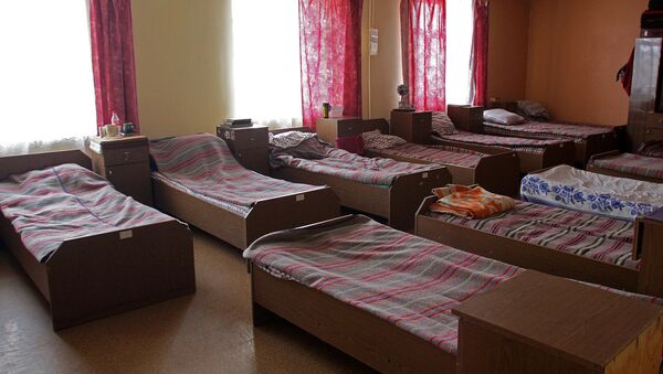 Кровати в приюте для бездомных - Sputnik Латвия