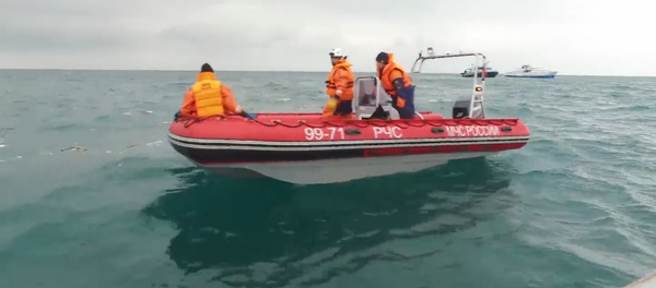 Поиск обломков и осмотр места крушения - спасатели продолжают операцию по Ту-154 Поиск обломков и осмотр места крушения - спасатели продолжают операцию по Ту-154 - Sputnik Латвия