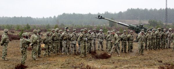 Военные учения НАТО на полигоне Адажи в Латвии. Архивное фото - Sputnik Латвия