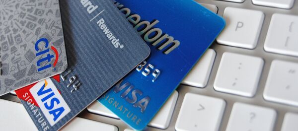 Банковская карта на клавиатуре Банковская карта на клавиатуре - Sputnik Latvija