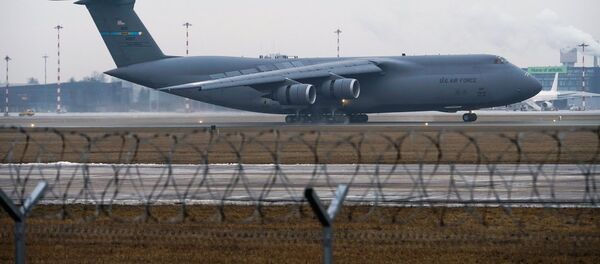 Lidmašīna Lockheed C-5M Super Galaxy Rīgas lidostā Lidmašīna Lockheed C-5M Super Galaxy Rīgas lidostā - Sputnik Latvija