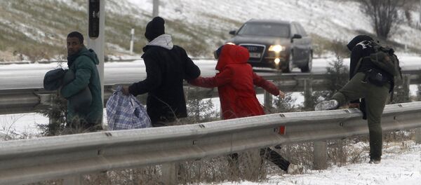 Группа беженцев - Sputnik Латвия
