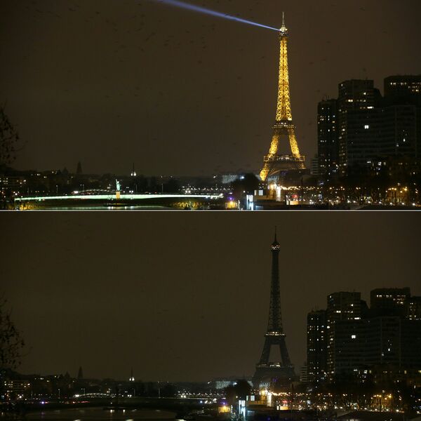 Eifeļa tornis Parīzē akcijas Zemes stunda laikā - Sputnik Latvija