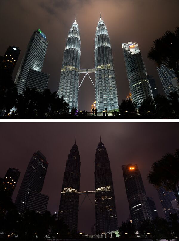 Башни Петронас в столице Малайзии Куала-Лумпуре во время акции Час Земли - Sputnik Латвия