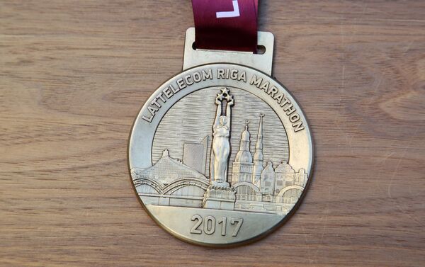Lattelecom Rīgas maratonā medaļa, autors – Visvaldis Asaris - Sputnik Latvija